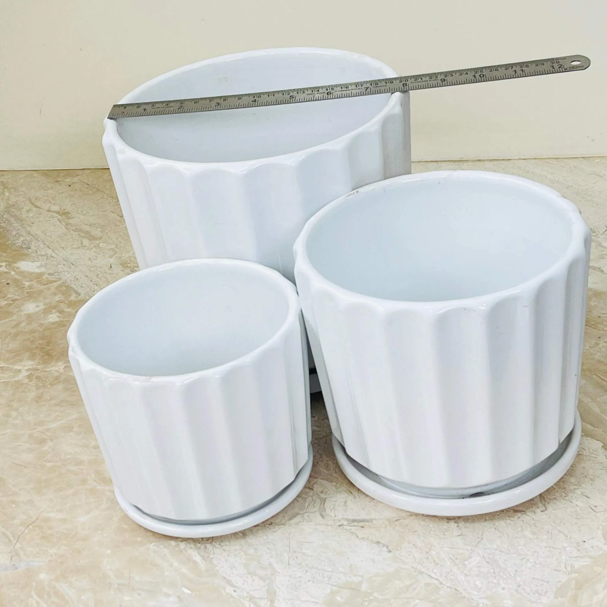 White Sculpted Ceramic Pot Set with Saucers (Set Of 3)